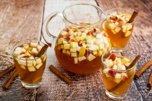 Autumn sangria with apples, pears and cinnamon